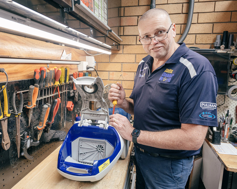 Neale at Coffs Cleaner World repairing a vacuum in his workshop on Lawson Crescent, Coffs Harbour